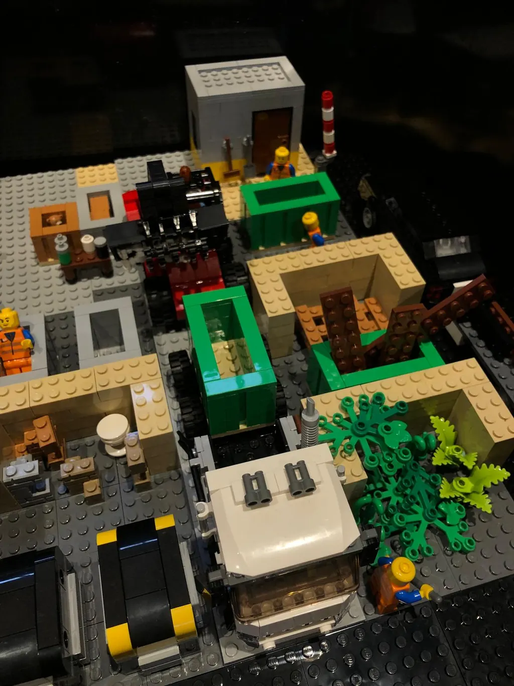 Brick model of a shopping street with its recycling collection points