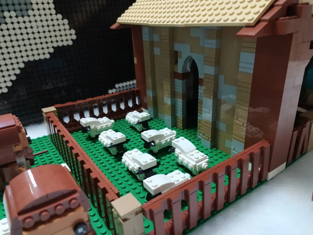Détail de l'étable de la crèche avec ses animaux et sa clôture